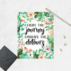 enjoy the journey embrace the detours surrounded by lush tropical greenery and pink and coral flowers on matte white paper