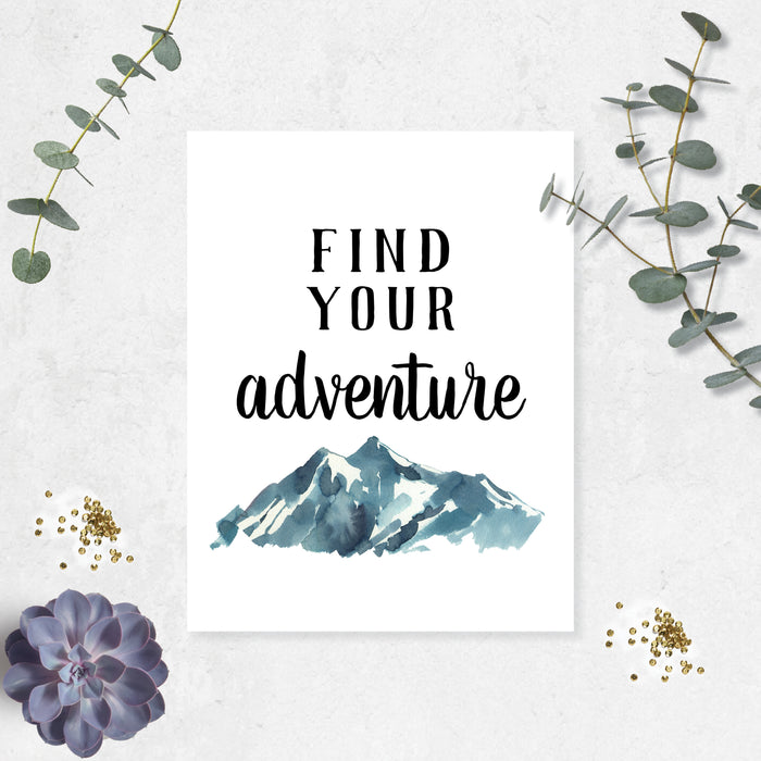 find your adventure in black ink above blueish gray mountains printed on matte white paper