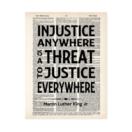 Martin Luther King Jr Quote Injustice anywhere is a threat to justice everywhere in black ink printed on salvaged dictionary paper