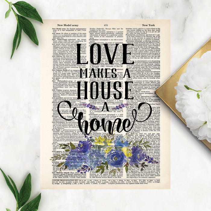 love makes a house a home printed above a spray of blue flowers with greenery on salvaged dictionary page 