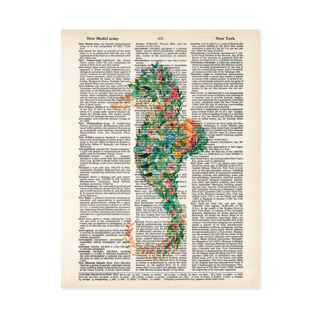 seahorse made of tropical flowers and greenery with coral and pink and blue tones printed on a dictionary page