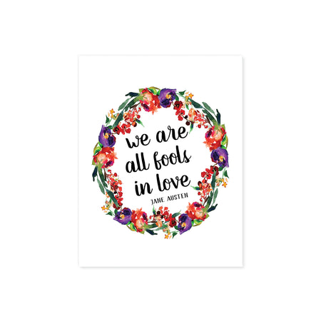 we are all fools in love Jane Austen quote surrounded by a watercolor wreath in purple, red, and green colors printed on matte white paper