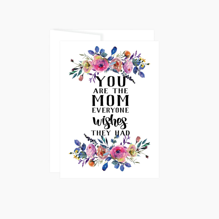 you are the mom everyone wishes they had with pink, blue and yellow watercolor flowers top and bottom on a greeting card that is blank inside